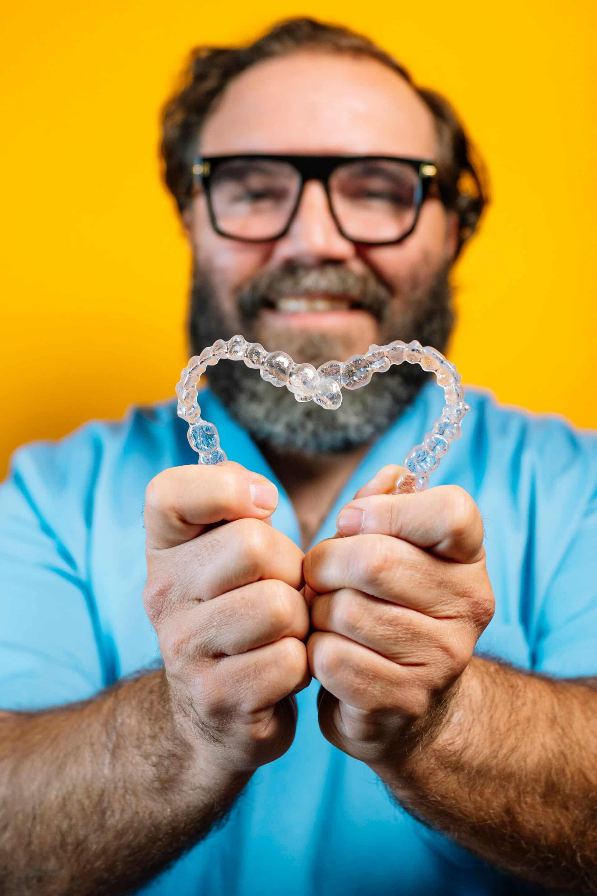 orthodontic plate for correcting an overbite on a boy's hand. close-up