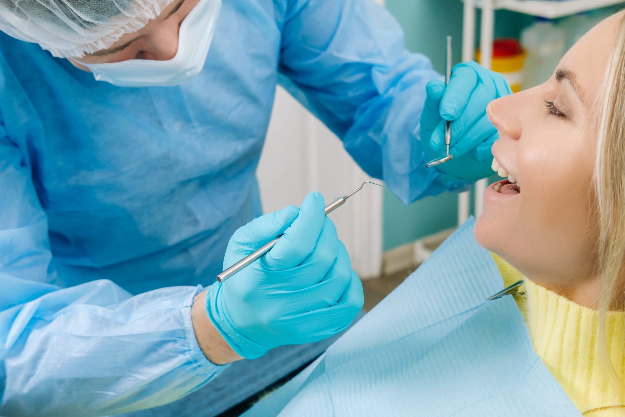 The patient treats her teeth at the dentist in the dental office . Dental fillings The patient treats her teeth at the dentist in the dental office . Dental fillings