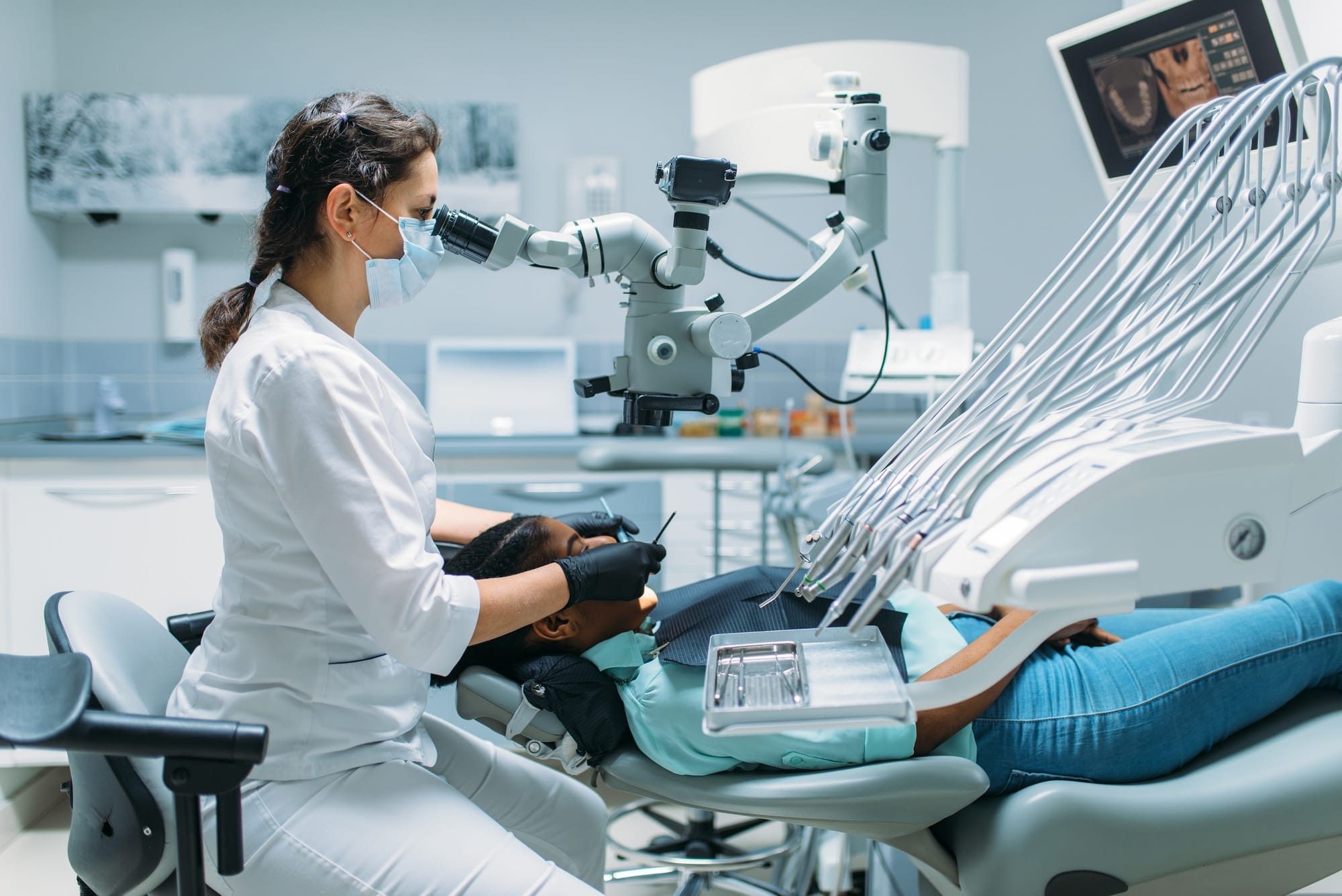 Dentist makes surgery to female patient Dentist makes surgery to female patient