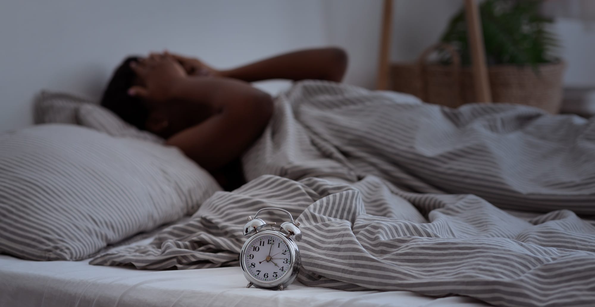 Sleepless, woman suffering from insomnia, sleep apnea or stress, headache or migraine Sleepless, woman suffering from insomnia, sleep apnea or stress, headache or migraine
