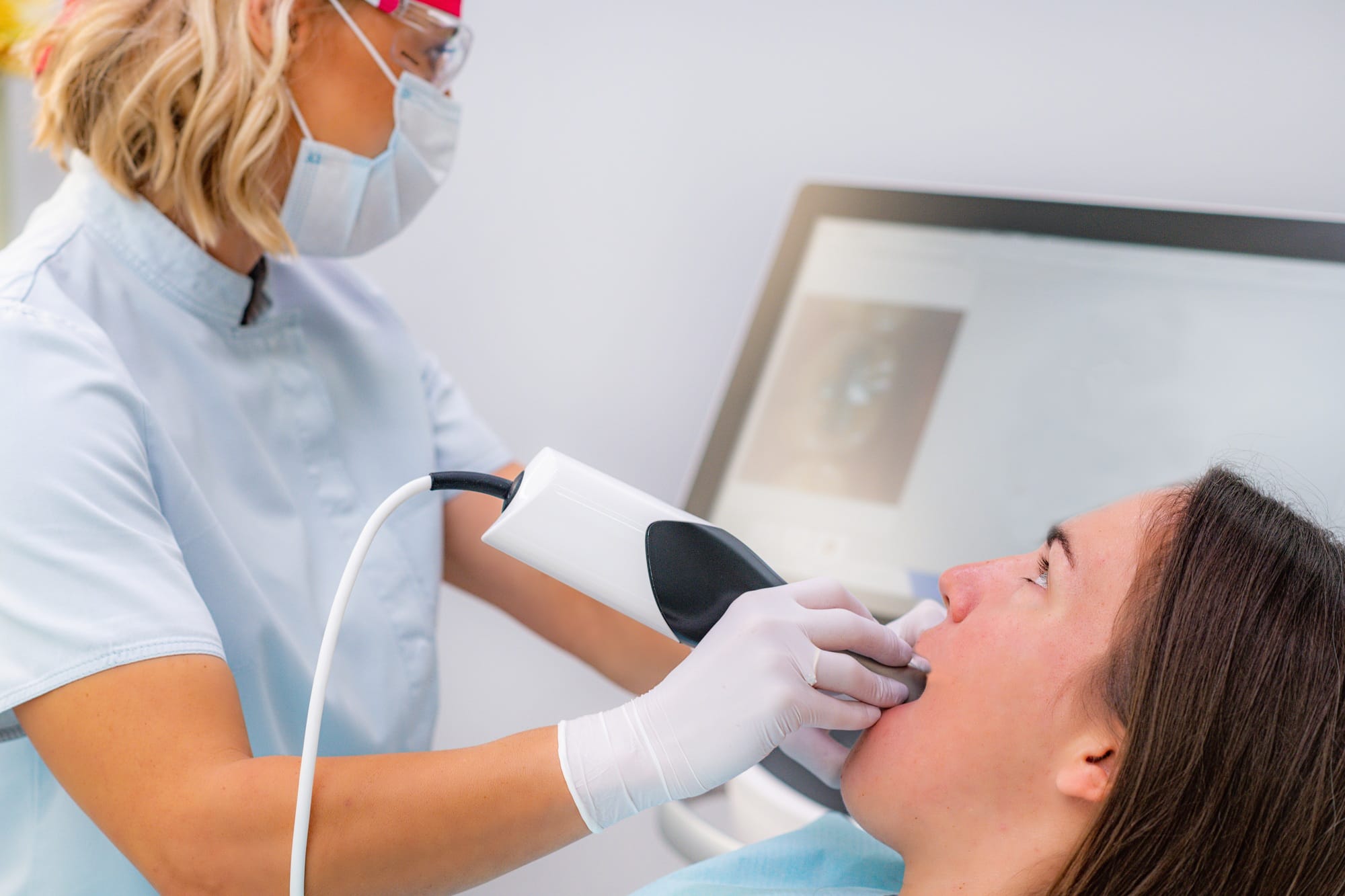 Prosthetic Dentistry. Scanning Teeth with Dental Camera. 3d Camera in Tooth Reconstruction Procedure Prosthetic Dentistry. Scanning Teeth with Dental Camera. 3d Camera in Tooth Reconstruction Procedure