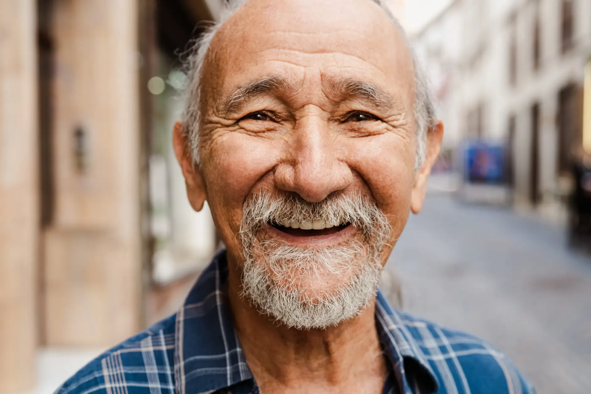 portrait-of-happy-senior-man-smiling-in-front-of-c-2024-11-26-12-42-10-utc-scaled (2)