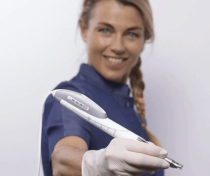 Quicksleeper 5 Dentist performing laser teeth whitening procedure on patient