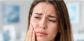 Patient experiencing tooth pain